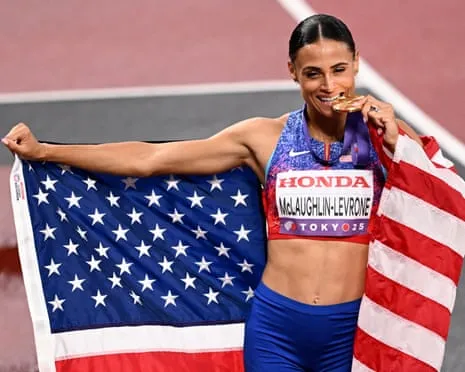 The American sprinter posts quickest women’s 400m in four decades to claim gold medal